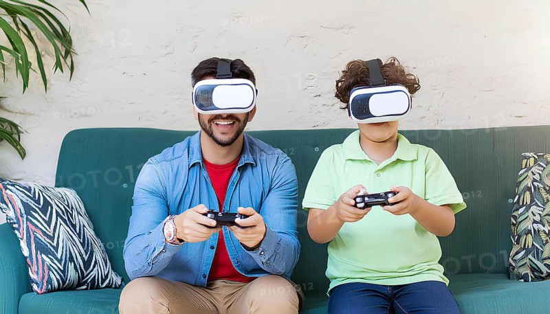 A man and a boy are playing a video game together on a couch. The boy is wearing a green shirt and the man is wearing a blue shirt, AI generated