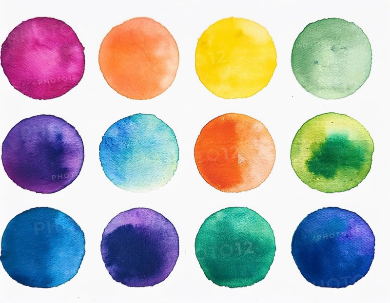Colorful watercolor circles painted on a white background create a vibrant and artistic design. Bright colors including orange, blue, red, and green offer inspiration for artistic creation and design projects, AI generated