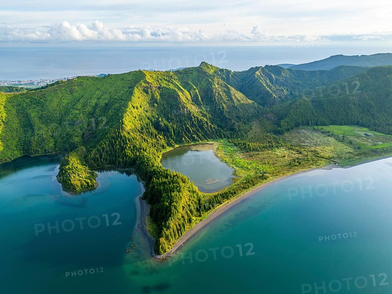 Lagoa do Fogo Lake on Sunny Morning. Green Lush Hills and Mountains. Azores, Sao Miguel Island. Portugal. Aerial View
