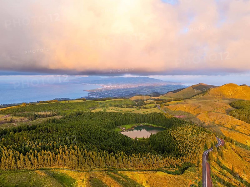 Hills, Forest and Lagoon Canario at Sunset. Atlantic Ocean. Azores, Sao Miguel Island, Portugal. Aerial View