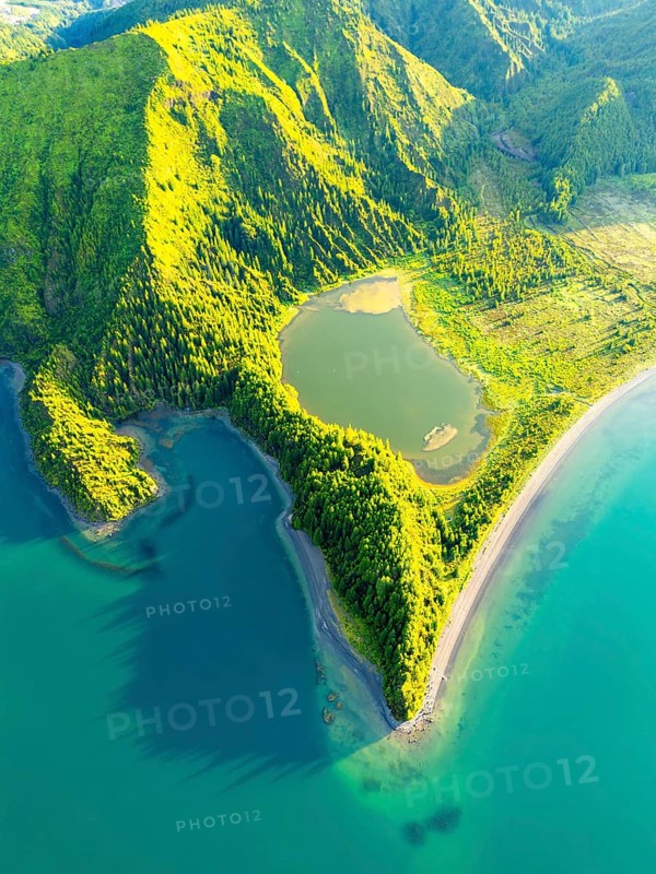 Lagoa do Fogo Lake on Sunny Morning. Green Lush Hills with Trees. Azores, Sao Miguel Island. Portugal. Aerial Overhead High Angle Shot