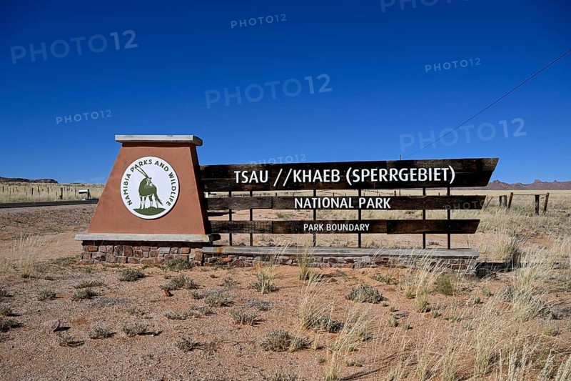 Sign at the entrance to Tsau//Khaeb National Park, diamond restricted area, near Aus, Karas Region, Namibia