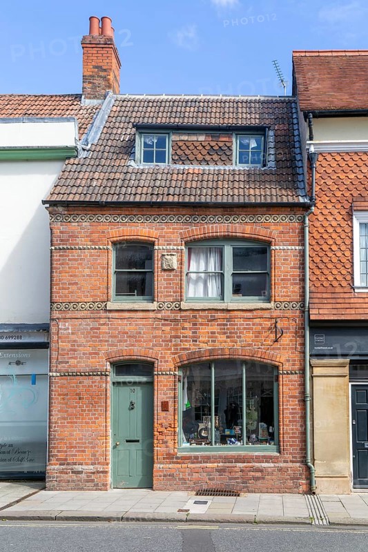 Historic listed building 10 St John's Street, Devizes, Wiltshire, England, UK - Shop premises, circa 1860s or 1870s remodelling of earlier building