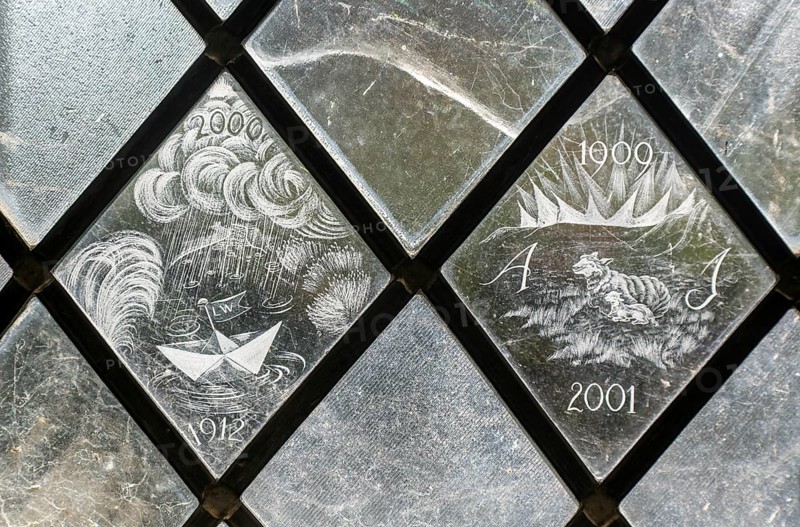 Glass engraved memorial panes, St Mary's church, Alton Barnes, Wiltshire, England, UK designed by Laurence and Simon Whistler