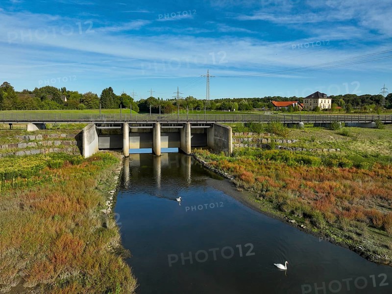 Dortmund, Castrop-Rauxel, North Rhine-Westphalia, Germany - River renaturalisation, renaturation of the Emscher, flood retention basin HRB Mengede. A new floodplain landscape is being created at the Emscher-Auen farm, expanding the area for flood protection during heavy rainfall and for biodiversity. The previously straightened Emscher is being given curves again and can meander through its new floodplain. Following the construction of a parallel sewer, the Emscher has been completely free of sewage since 2022. The river was previously an open, above-ground combined sewer with rainwater and wastewater