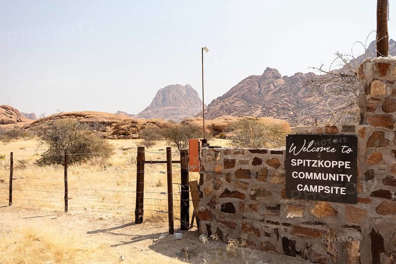 Entrance to the Spitzkoppe Community Campsite, Namibia - 1 Setembro, 2025: with a scenic view of the iconic granite peaks and surrounding arid landscape