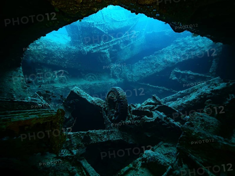 Red Sea, underwater, scuba, Egypt, wreck, Thistlegorm, sunk, world war, shipwreck, boat, ship, navy, transporter, blue, scrap, tyre, wheel, mystical, to the outside, from the inside, hold, cargo hold