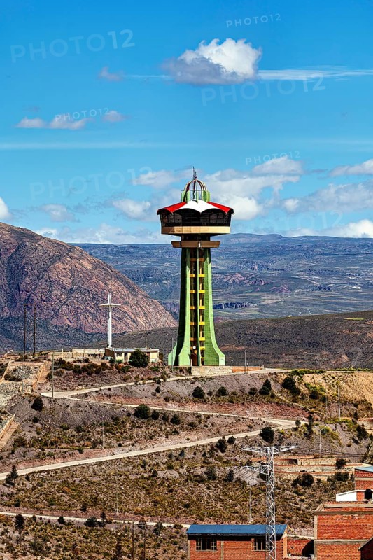 Large observation tower on a hill with sweeping views of the mountains and sky, the water tower of the city of Potosi in Bolivia