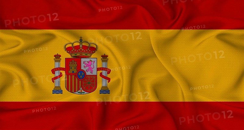 Spain flag waving with fabric texture. Close-up of the Spain flag waving with fabric texture