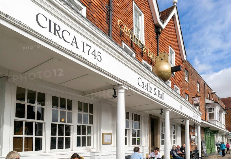 Frontage of historic building, Castle and Ball hotel public house, Marlborough, Wiltshire, England, UK