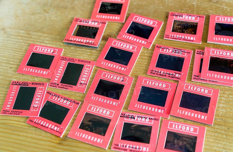 Red cardboard slide mounts some with written captions Ilford Ilfochrome transparency positive film, 1960s
