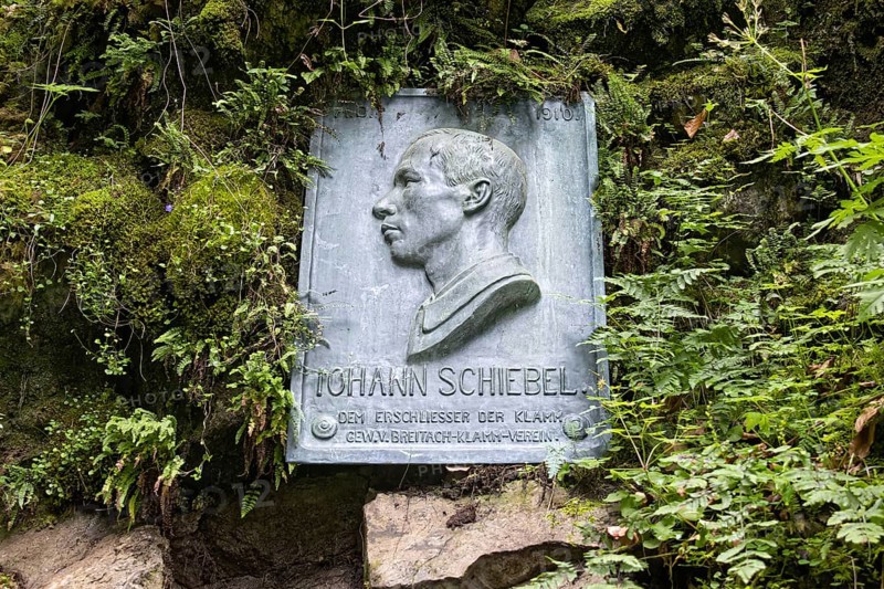 Memorial plaque for Pastor Johannes, Johann Schiebel, developer of the gorge and founder of Breitachklammverein eG. Breitachklamm gorge near Oberstdorf, the deepest rocky gorge in Central Europe