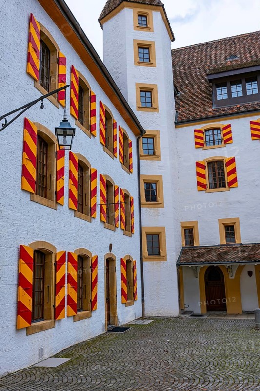 Neuchatel Castle with Window and Shutter and Patio in Old Town in a Foggy Day in City of Neuchatel, Canton Neuchatel, Switzerland