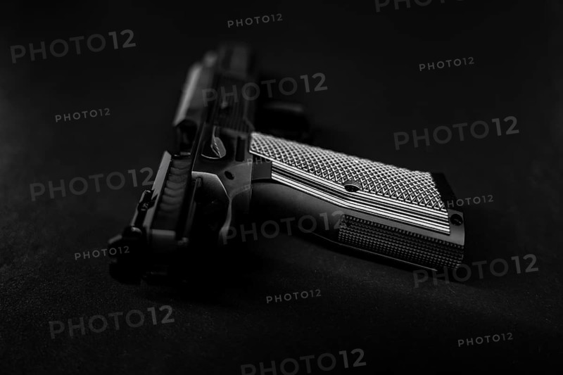 Modern Elegant Sport Handgun For IPDA on Grey Background in Switzerland