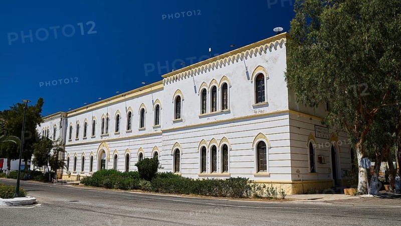 Marine Administration, Caserma Marina 1930, Today Municipal Administration, White historic building with arched windows and green surroundings, Historicism, Art Deco, Rationalism, Portolago, Lakki, Leros, Dodecanese, Greek Islands, Greece
