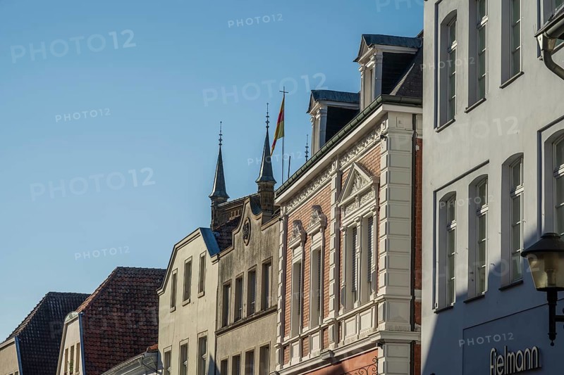 Row of historic buildings with ornate facades under a clear sky, Warendorf, Münsterland, North Rhine-Westphalia