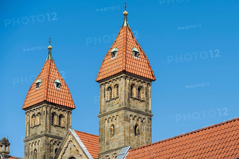 Two Gothic church towers with red tiled roofs under a clear blue sky, St Mary's Church in Warendorf, Münsterland, North Rhine-Westphalia