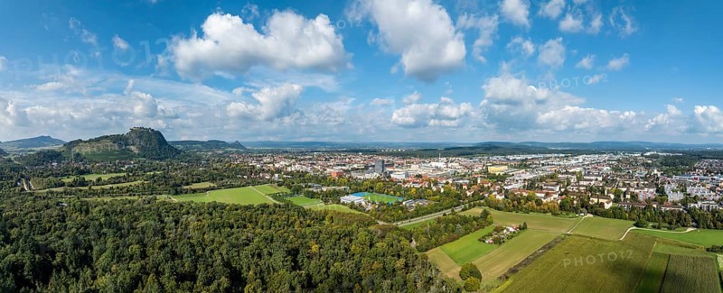 Aerial view, panorama of the town of Singen am Hohentwiel with the Münchriedstadion and Friedrich-Wöhler Gymnasium, on the horizon the Hegauberge, district of Constance, Baden-Württemberg, Germany