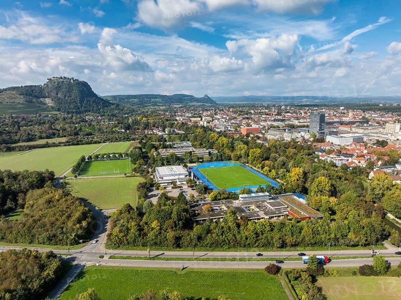 Aerial view of the town of Singen am Hohentwiel with the Münchriedstadion and Friedrich-Wöhler Gymnasium, on the horizon the Hegauberge, district of Constance, Baden-Württemberg, Germany