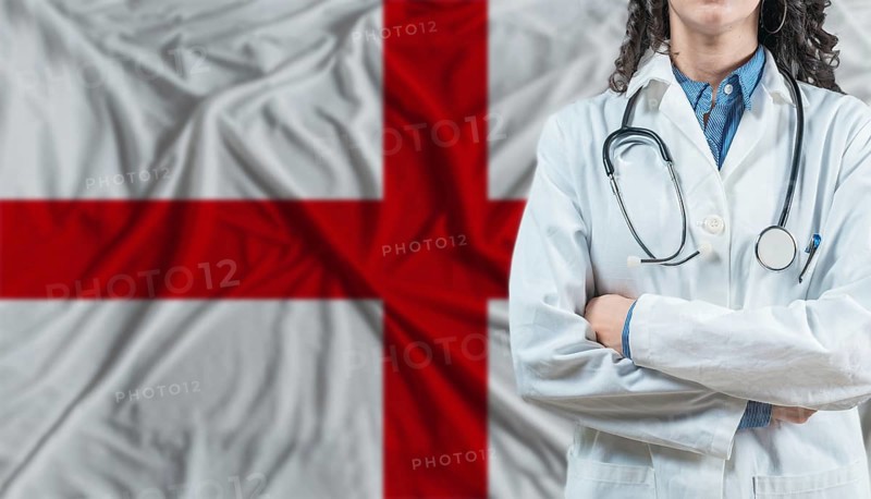 Medical professional on England flag. Healthcare and wellness in England, Concept