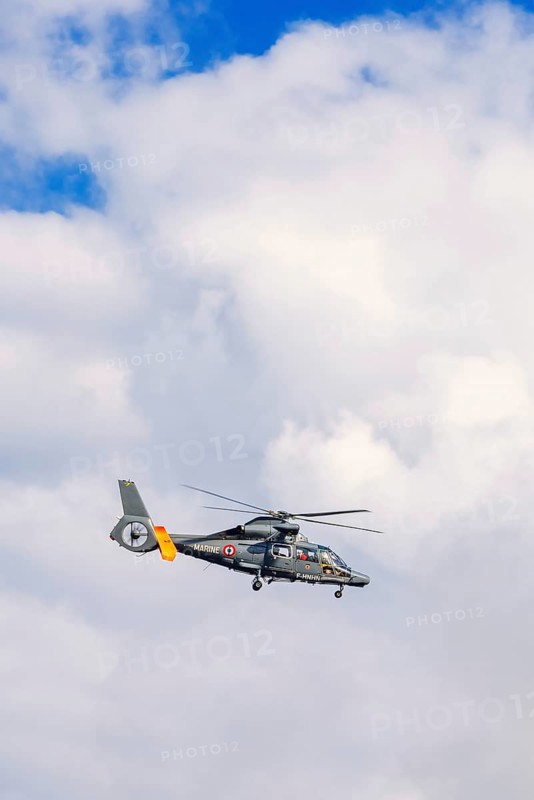 French marine helicopter flying on the sky, Crozon peninsula, Bretagne, France