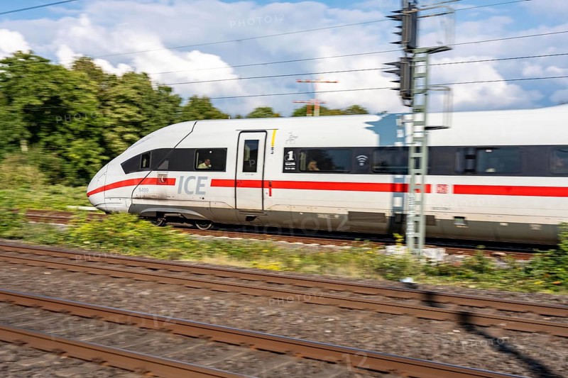 Train traffic on one of the busiest railway lines in Germany, ICE train between Duisburg and Düsseldorf, commuter trains, regional trains, ICE and IC long-distance trains and freight traffic, North Rhine-Westphalia, Germany