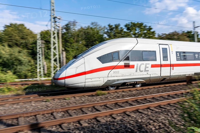 Train traffic on one of the busiest railway lines in Germany, ICE train between Duisburg and Düsseldorf, commuter trains, regional trains, ICE and IC long-distance trains and freight traffic, North Rhine-Westphalia, Germany