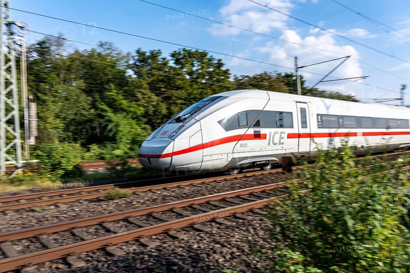 Train traffic on one of the busiest railway lines in Germany, ICE train between Duisburg and Düsseldorf, commuter trains, regional trains, ICE and IC long-distance trains and freight traffic, North Rhine-Westphalia, Germany