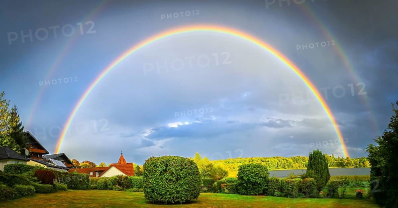 Double rainbow over the Großer Pönitzer See in Pönitz am See, Schleswig-Holstein, Germany