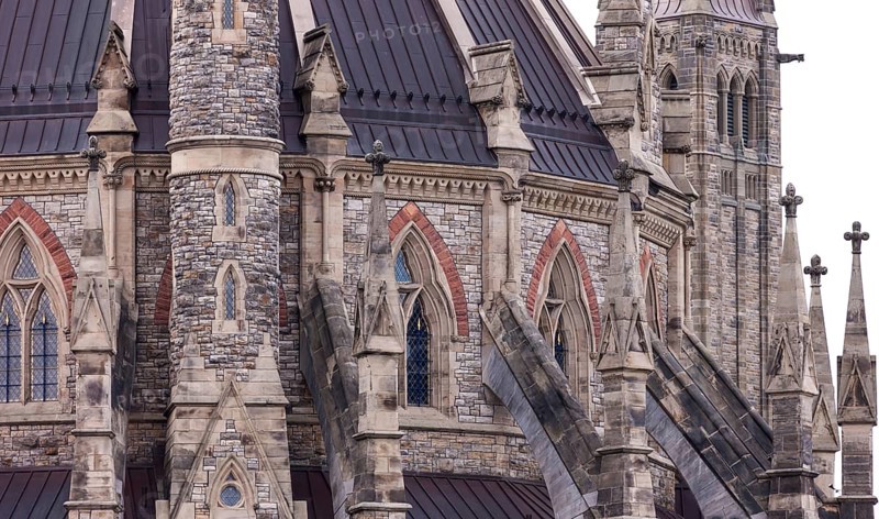 A close-up of the Canadian Parliament Buildings with gothic design and intricate details in Ottawa, Ontario, Canada, North America