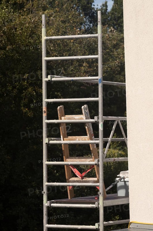Borken, NRW, Germany, Scaffolding structure with ladder supporting outdoor construction and renovation work