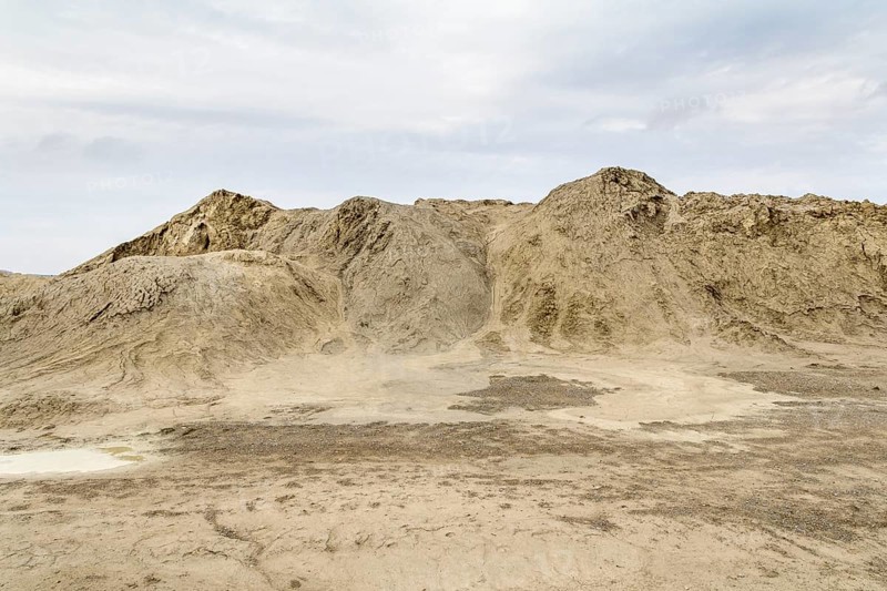 Outdoor shot of a light brown heap of earth