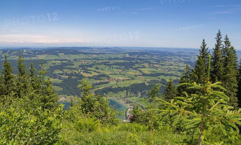 Idyllic aerial view seen from the Immenstaedter Horn around Immenstadt at the Allgaeu region in Swabia, Germany