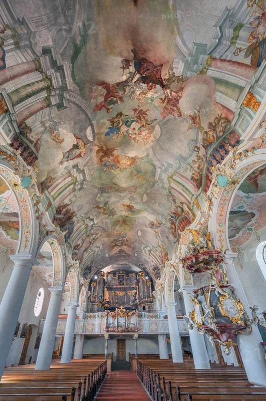 Church of St Gallus and Ulrich, nave with organ loft and ceiling frescoes, Kisslegg, Allgäu, Baden-Württemberg, Germany