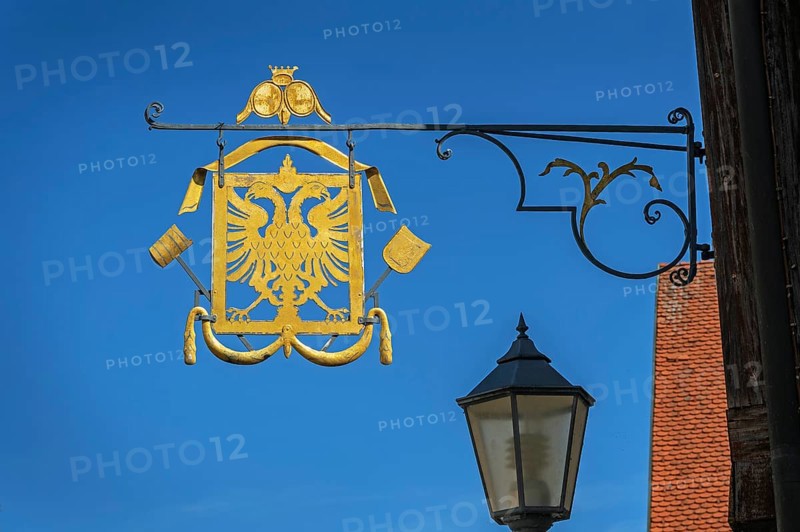 Nose shield with double eagle ind guild sign of the brewers and maltsters in Kisslegg, Allgäu, Baden-Württemberg, Germany