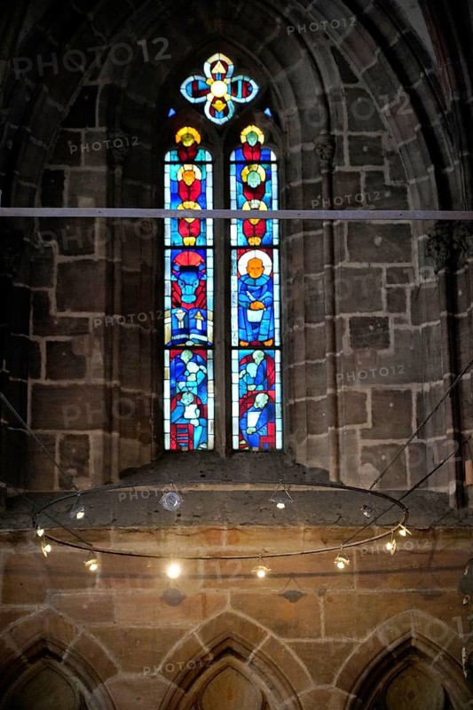 Stained glass window with artistic depictions in a Gothic church, Church of St. Lawrence, Nuremberg, Middle Franconia, Franconia, Bavaria, Germany