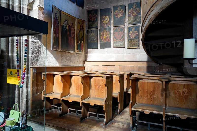 Wooden benches and religious wall decorations in a Gothic church, St Lorenz Church, Nuremberg, Middle Franconia, Franconia, Bavaria, Germany
