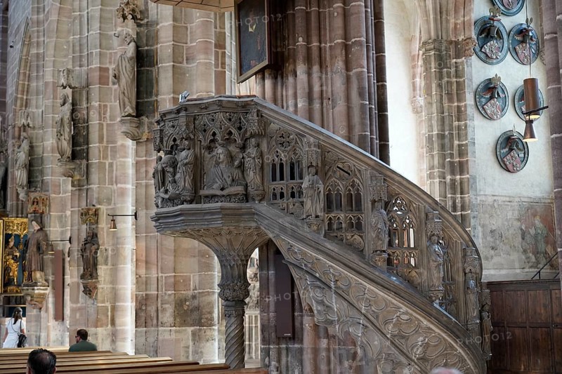 Detail of an ornately carved pulpit in an old church with depictions and figures, Church of St Lawrence, Nuremberg, Middle Franconia, Franconia, Bavaria, Germany