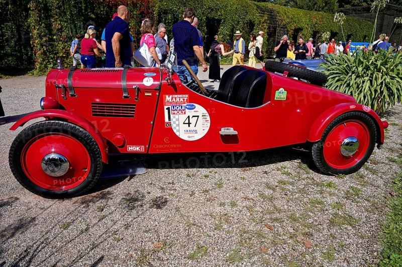 DKW, year of construction 1938, Oldtimer Classic, Gala International Concours d'Elegance Schwetzingen 2025, Germany, Europe, Red racing car at a competition, side view, surrounded by people on a sunny day