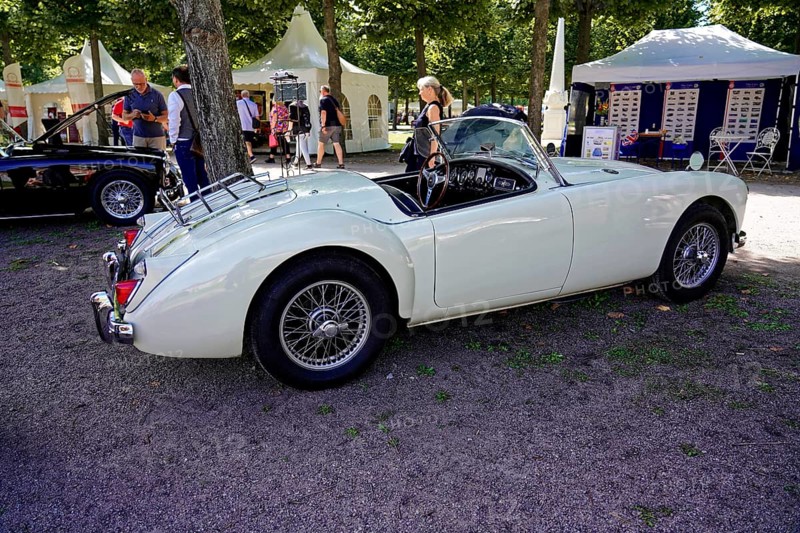 Oldtimer Classic, Gala International Concours d'Elegance Schwetzingen 2025, Germany, Europe, A white convertible vintage MG in a park at an exhibition