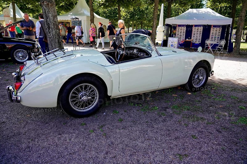 Oldtimer Classic, Gala International Concours d'Elegance Schwetzingen 2025, Germany, Europe, Side view of a white vintage MG in an exhibition in the park
