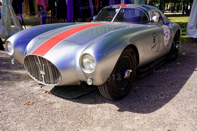Masarati, Oldtimer Classic, Gala International Concours d'Elegance Schwetzingen 2025, Germany, Europe, Silver classic car with red stripe in retro style on a road