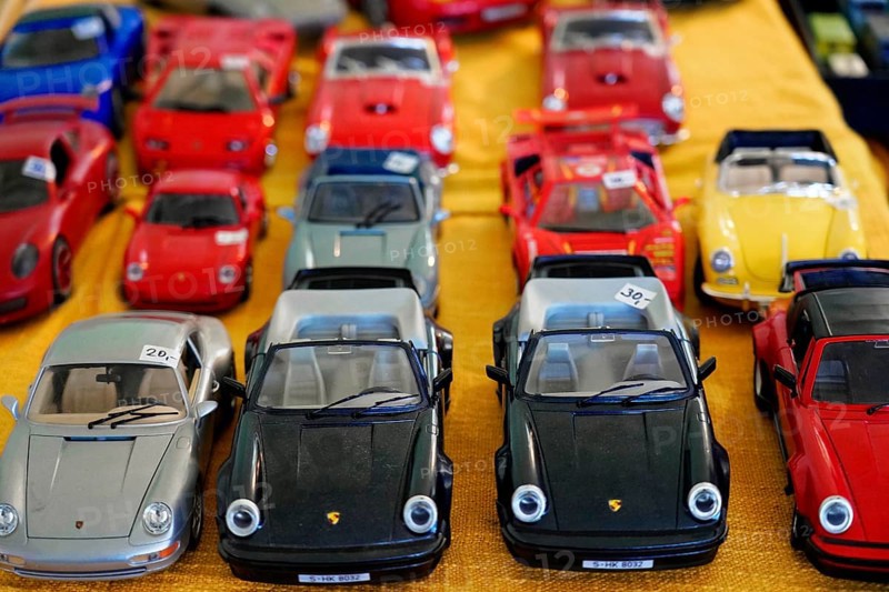 Oldtimer Classic, Gala International Concours d'Elegance Schwetzingen 2025, Germany, Europe, Various colourful model cars, mainly Porsche, arranged on a table