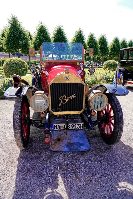 Oldtimer Classic, Gala International Concours d'Elegance Schwetzingen 2025, Germany, Europe, Red Benz vintage car with historic details shows classic elegance on a gravel road