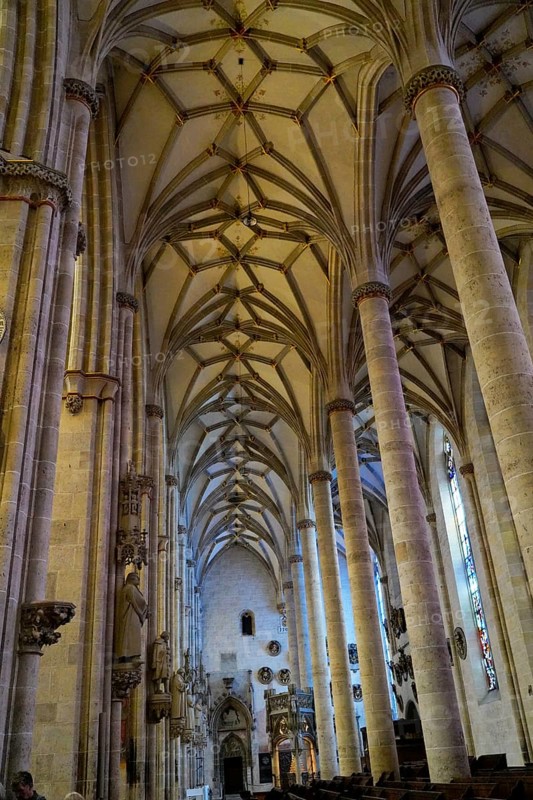 The interior of the largest Protestant church in Germany. It has the world's highest church tower, Ulm Minster, Germany, Europe, High vaulted ceiling with decorative columns in a church, Ulm