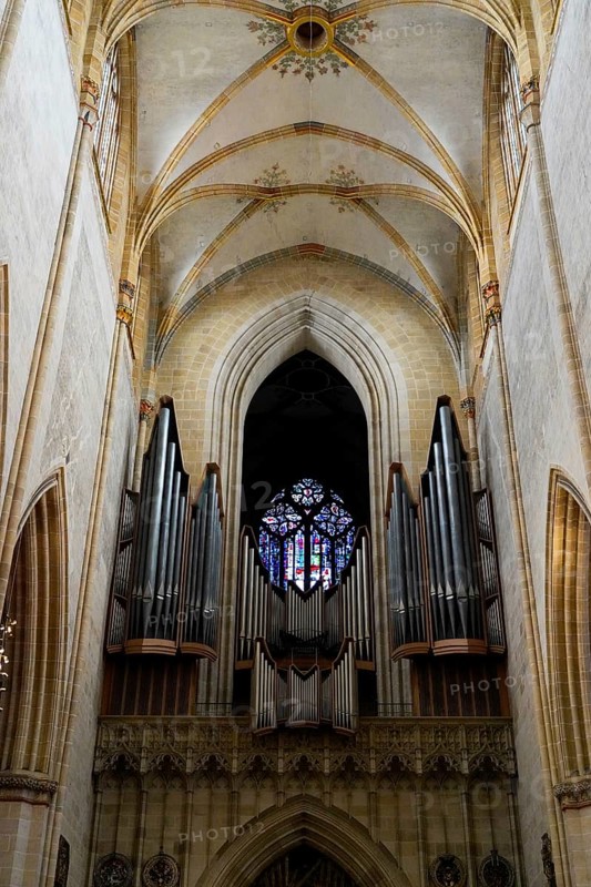 The interior of the largest Protestant church in Germany. It has the world's highest church tower, Ulm Minster, Germany, Europe, Sublime interior of a cathedral with a large organ and remarkable stained glass window, Ulm