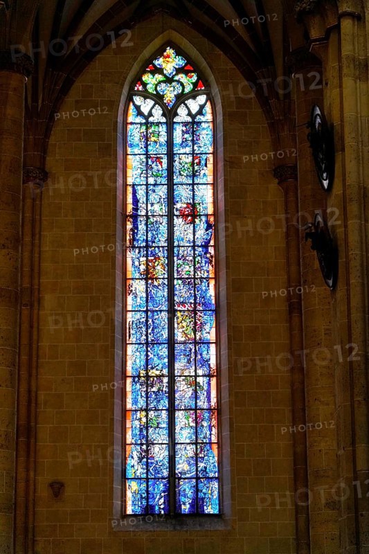 The interior of the largest Protestant church in Germany. It has the world's highest church tower, Ulm Minster, Germany, Europe, High, beautiful stained glass window in the cathedral with a lively play of colours and artistic details, Ulm