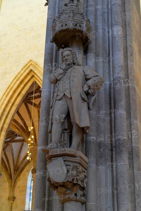 Sebastian Bach, The interior of the largest Protestant church in Germany. It has the world's tallest church tower, Ulm Minster, Germany, Europe, Stone statue of a man inside a cathedral representing tradition and historical architecture, Ulm