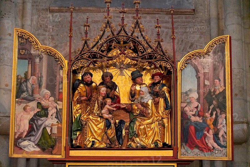 The interior of the largest Protestant church in Germany. It has the world's highest church tower, Ulm Minster, Germany, Europe, Richly decorated altar with golden figures and paintings in a church, Ulm
