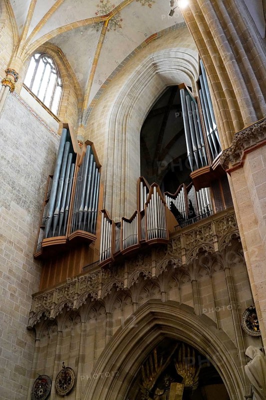 The interior of the largest Protestant church in Germany. It has the world's highest church tower, Ulm Minster, Germany, Europe, Large church organ made of wood and metal, surrounded by Gothic elements, Ulm